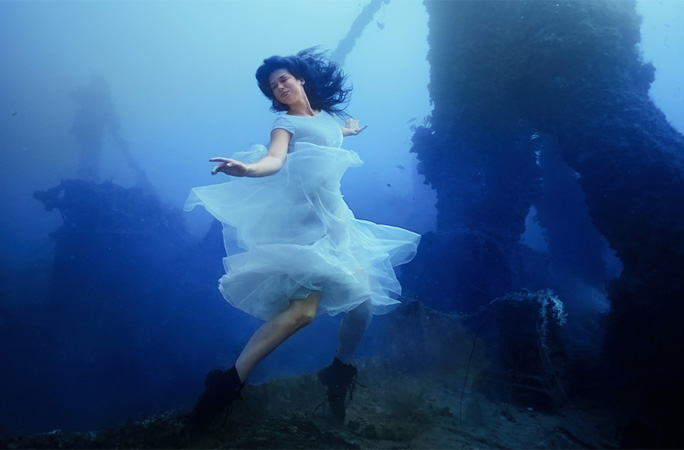 Underwater photoshoot woman