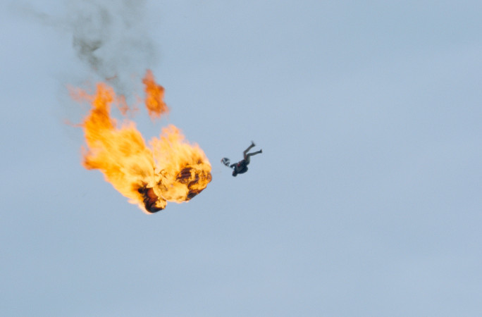 Tom falling while on fire