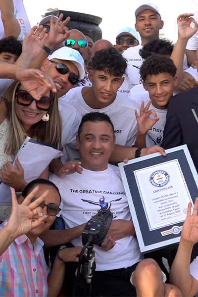 Walaa celebrating with his certificate