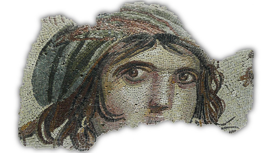 A damaged Roman mosaic showing a pair of staring eyes.