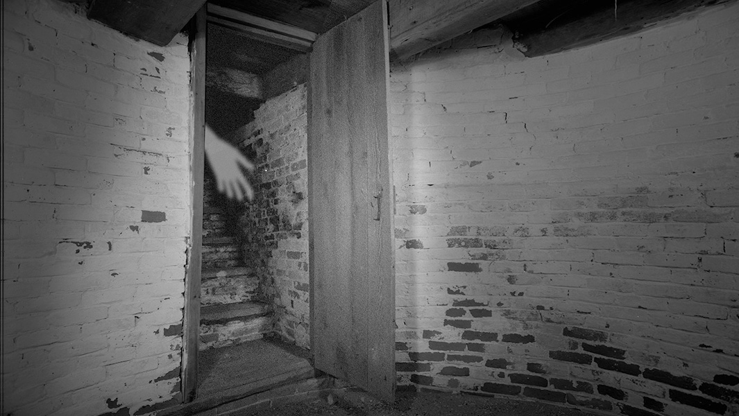 Ghost hunter Harry Price and a creepy cellar door
