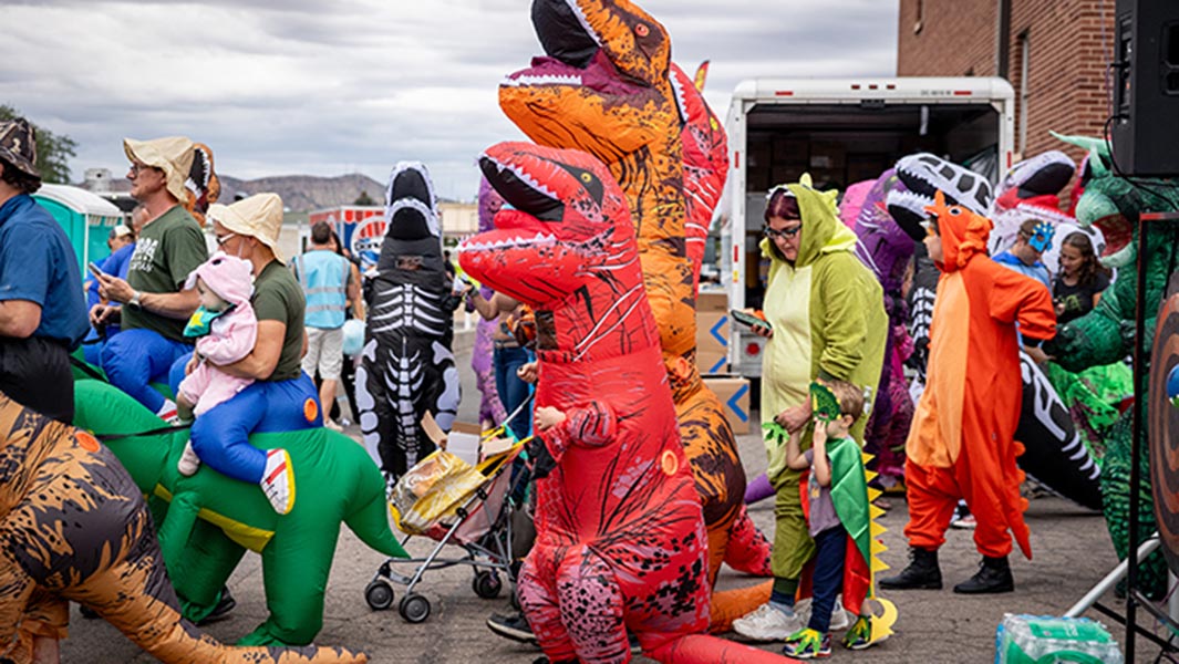 Montage of People Power from August 2026: Dinosaurs, clarinets and Hawaiian shirts