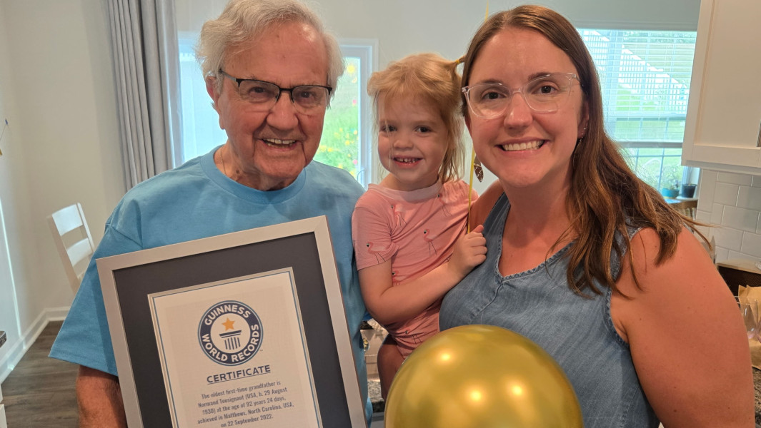 Split header image of Normand unveiling his certificate, and Normand holding baby Madison