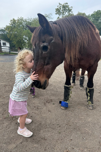 Paige's daughter kissing Fancy