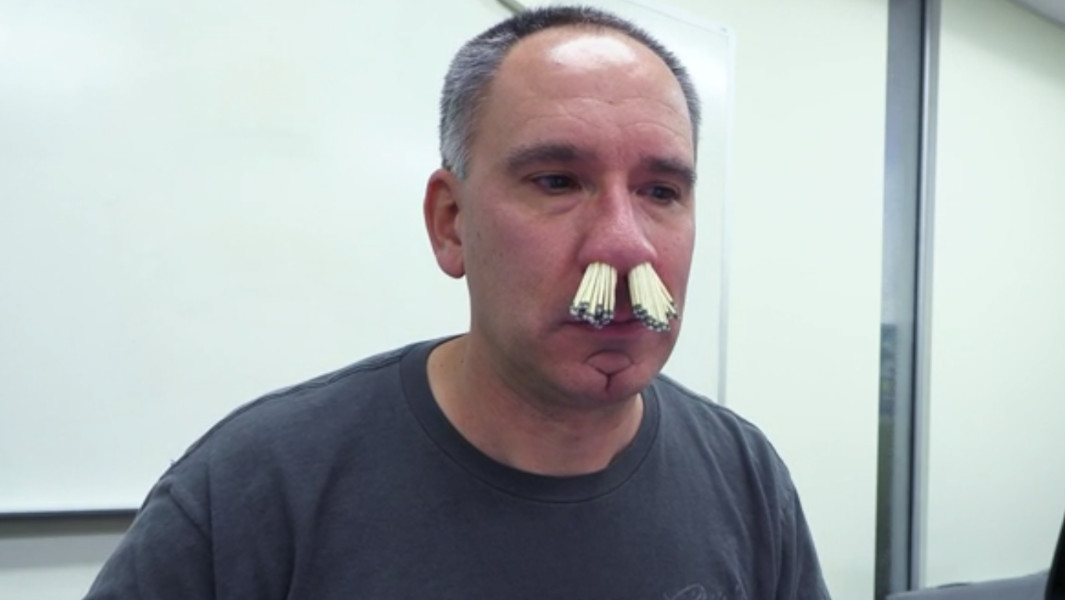 Split image of Scott with the matches in his nose