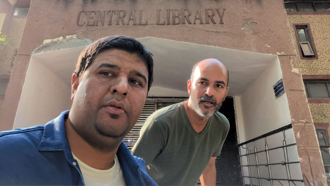 Sujoy Kumar Mitra and Prateek Choraria outside of a library