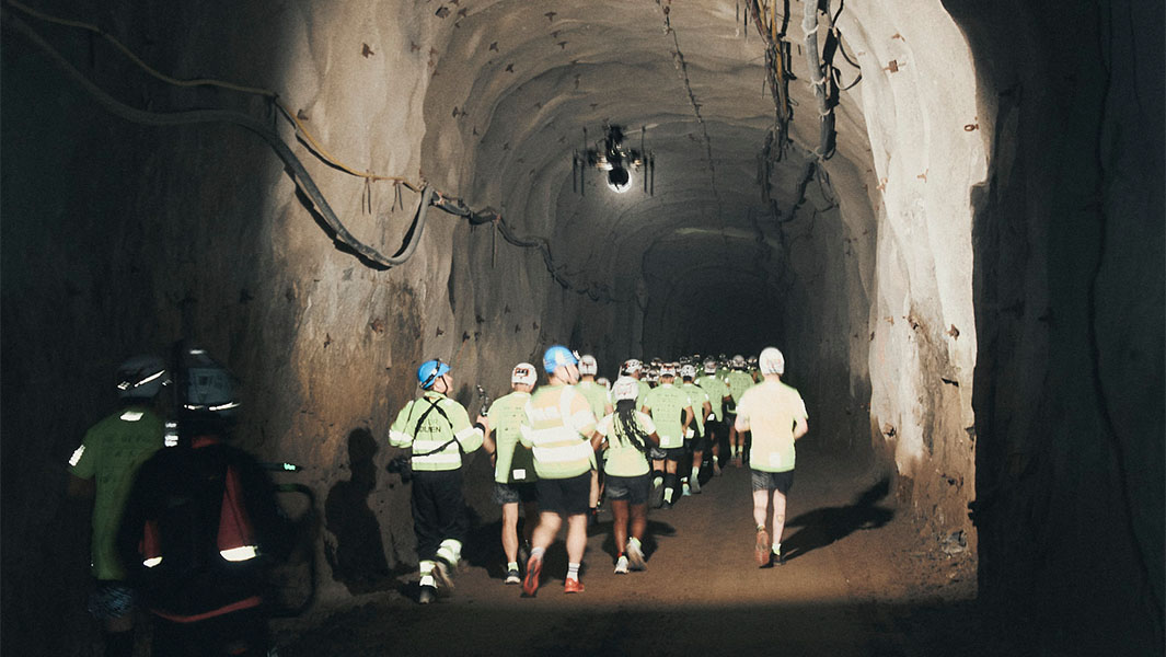 split image of runners doing the deepest marathon