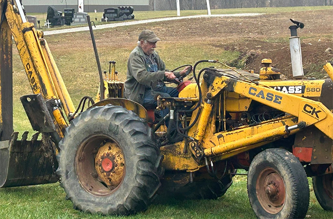 Allen on his tractor