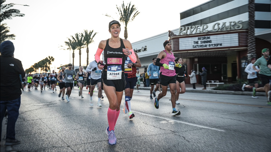 Split image of Carrie with her medal and Carrie crossing the finish line