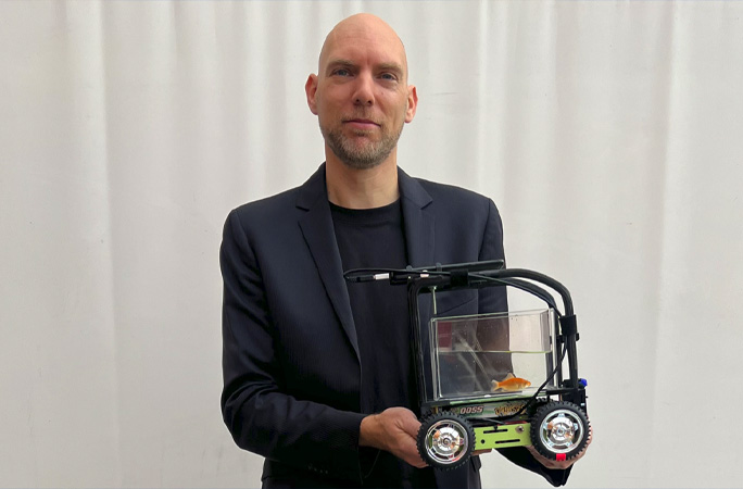 Thomas posing with blub in car