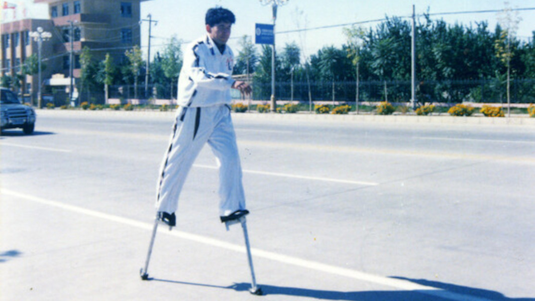 Split image of Saimaiti Yiming walking in his stilts and at the ceremony