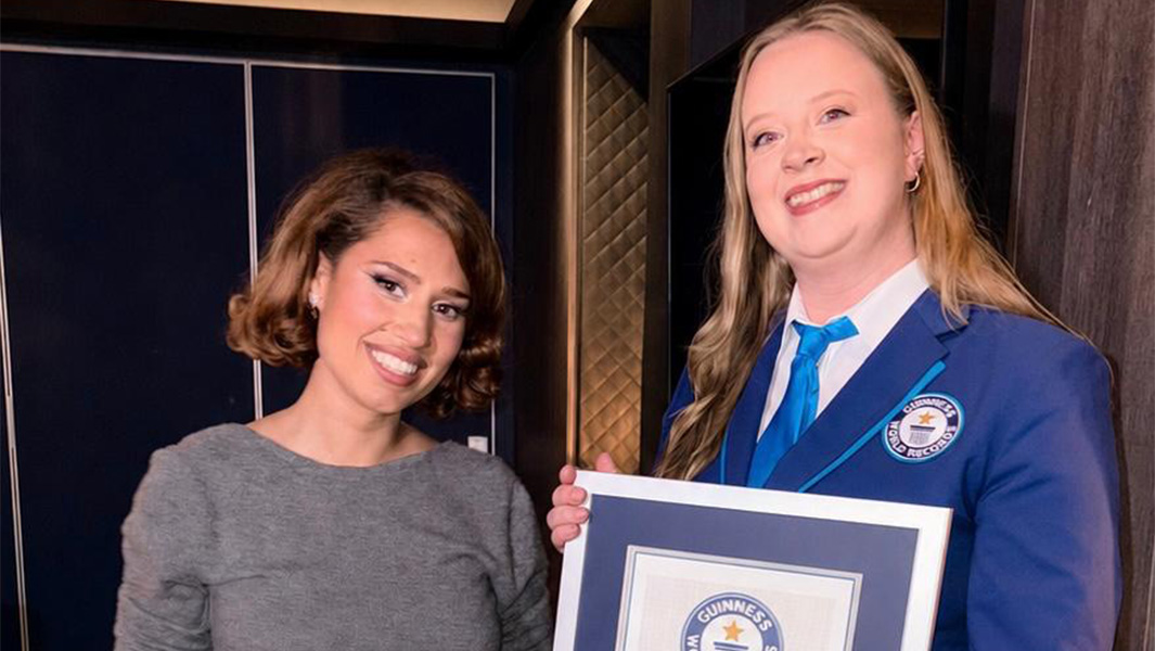 Raye and GWR's Emma Salt holding certificates