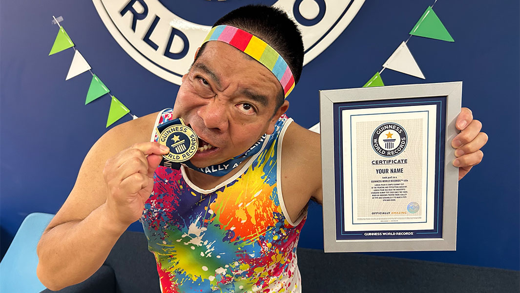split image of Mr Cherry pulling on lots of pairs of underpants and biting a GWR medal