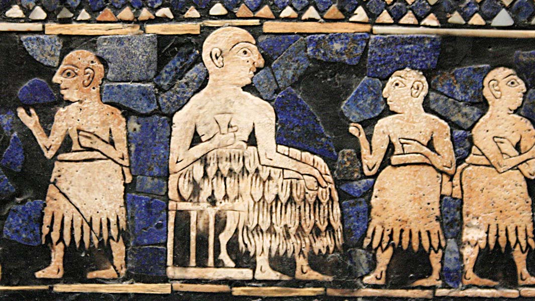 An ancient mesopotamian carving, showing a king surrounded by attendants.