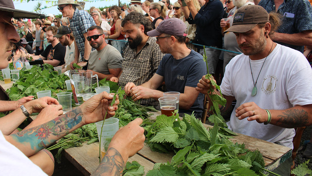 world-stinging-nettle-eating-championship-2025-female-champion-and-mid-contest