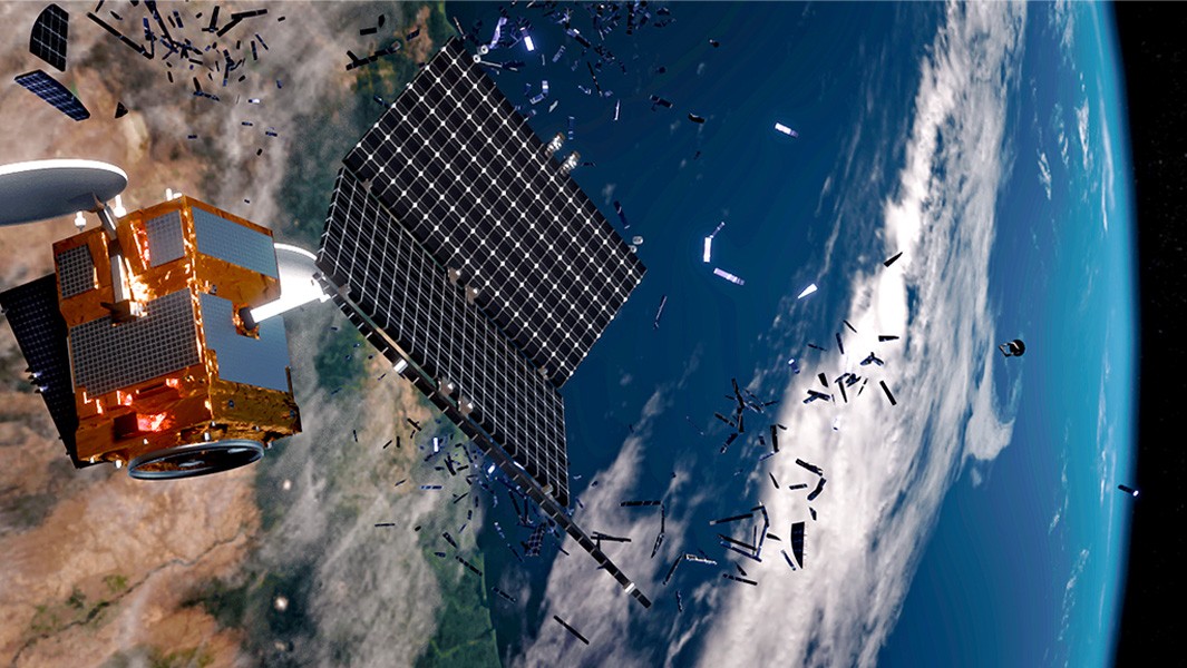 A 3D render showing a satellite breaking up in orbit