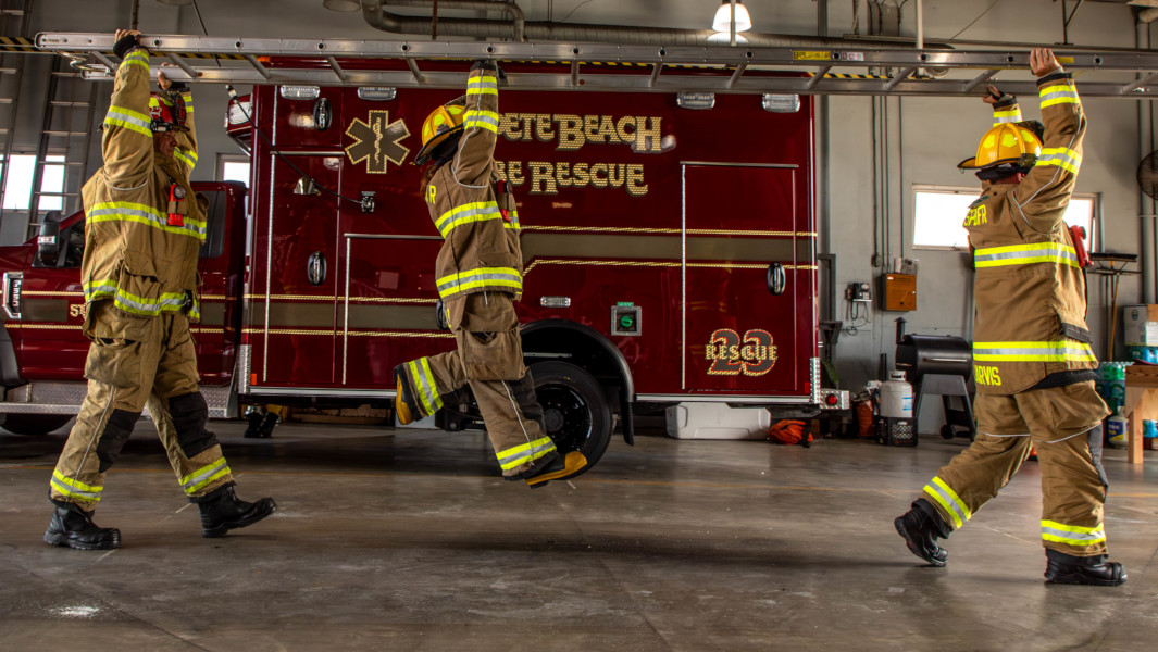 Split image of Autumn holding a firehose in her uniform, and Autumn walking next to her captains