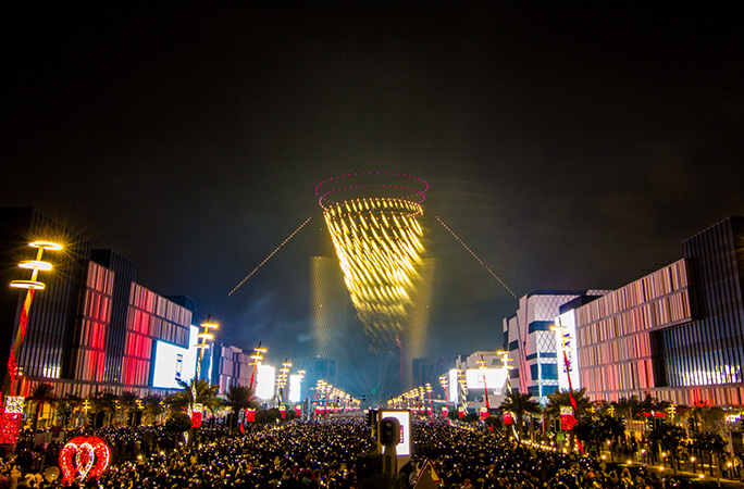 fireworks in the shape of a yellow spiral