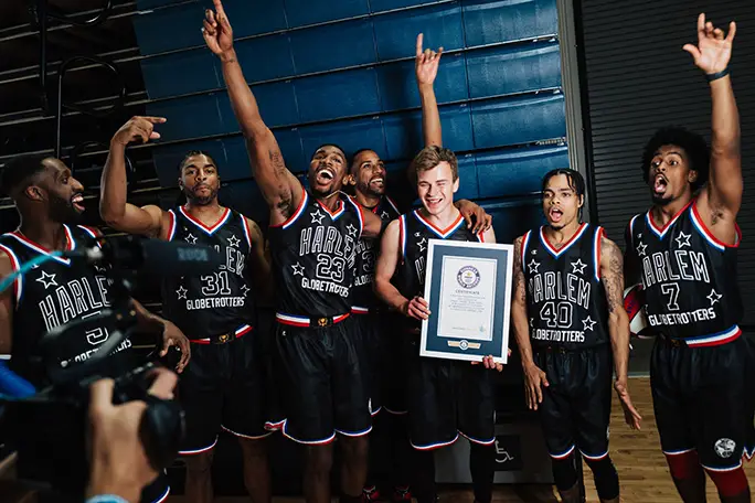 Photo of the Harlem Globetrotters with GWR certificate