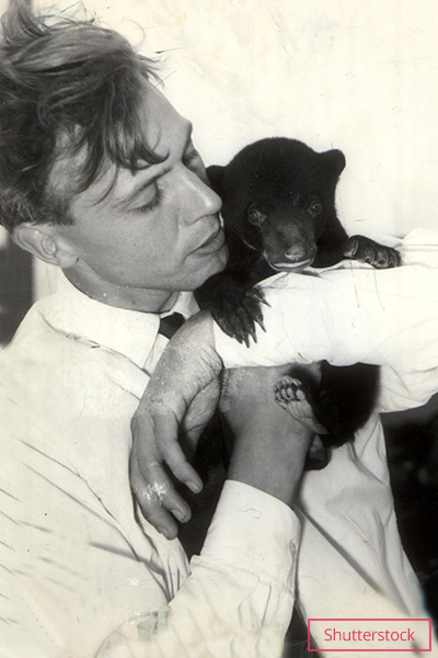 Attenborough with Malaysian sun bear cub Benjamin in Borneo in 1956