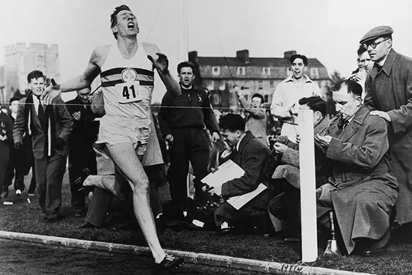 Roger being photographed while running