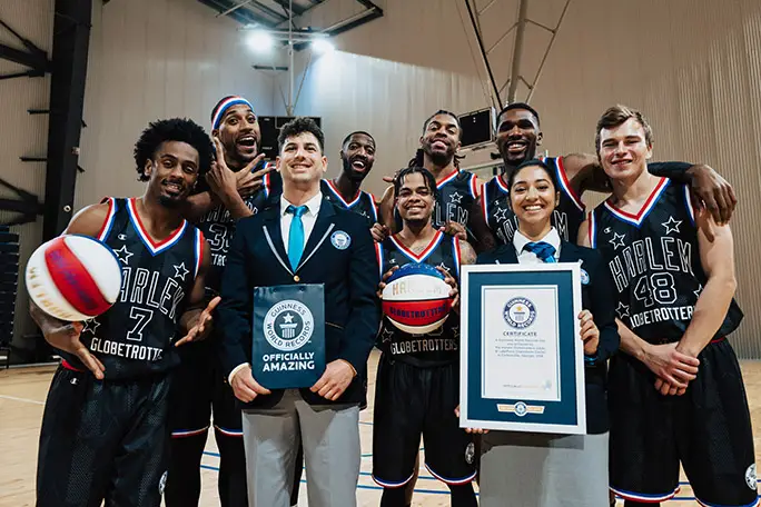 Harlem Globetrotters receiving certificate