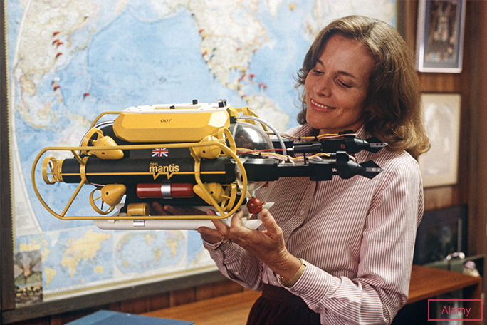 Syvlia Earle holding mantis and smiling