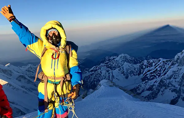 Viridiana Álvarez Chávez on mountain peak