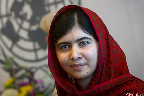 Malala Yousafzai smiling into camera