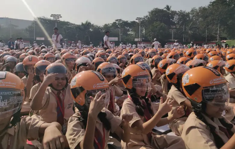 Largest gathering of people wearing helmets